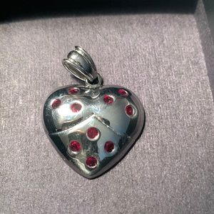 Sterling silver and ruby gemstone heart pendant